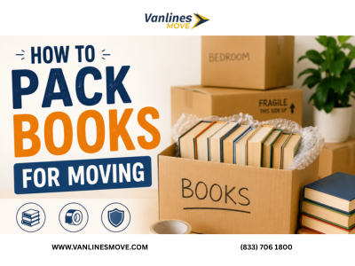 Person carefully packing books into moving boxes with packing paper and tape, demonstrating how to pack books for moving.